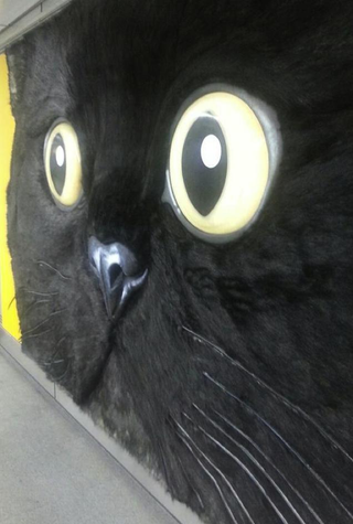 Illustration for article titled Tokyo's Giant Cat Billboard Is Big Enough to Pet